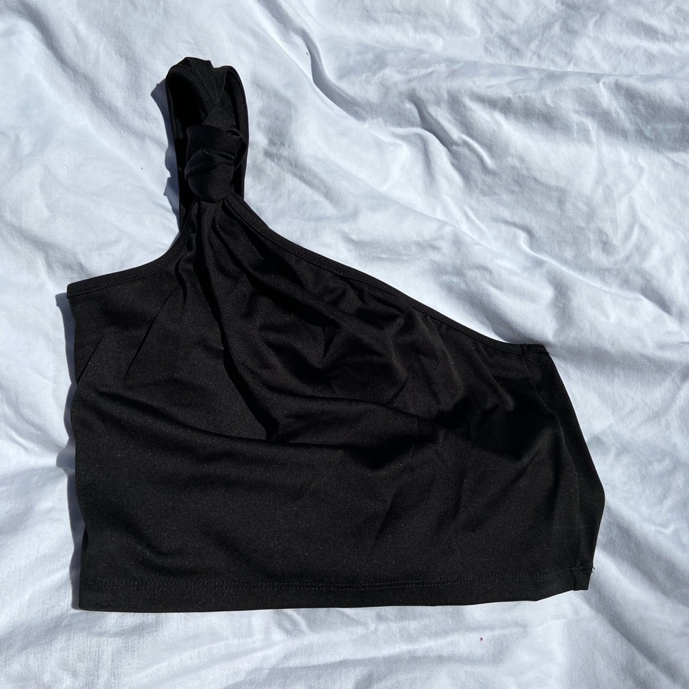 Black one shoulder crop top.